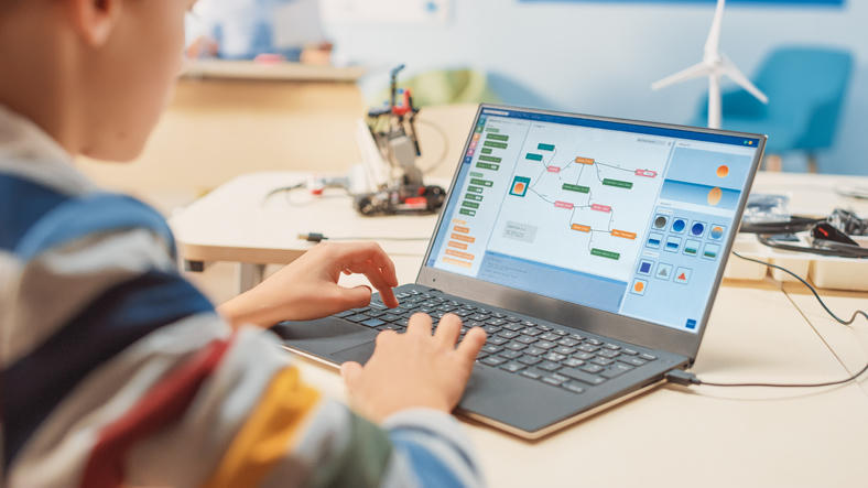 Young coder learning programming