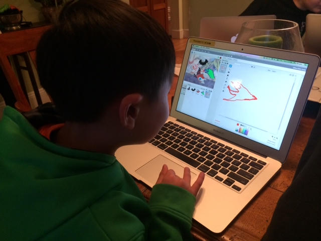 Young student learning to code